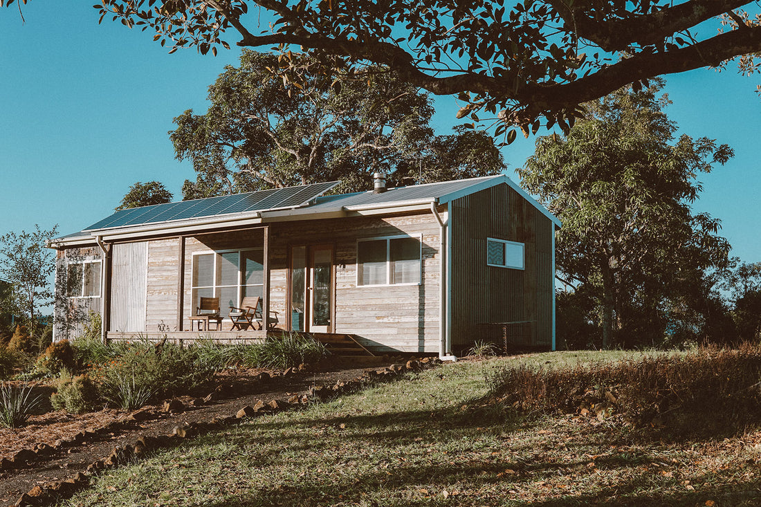Cabin with off grid solar panels installed